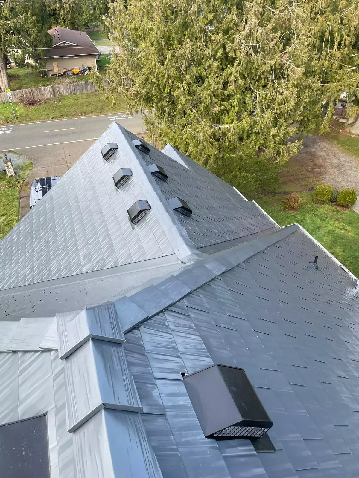 Bonney Lake, WA 98391 | Interlock Metal Roofing Deep Charcoal Cedar Shingle Roof | Ridge Caps and Vents | WAWA-23-028